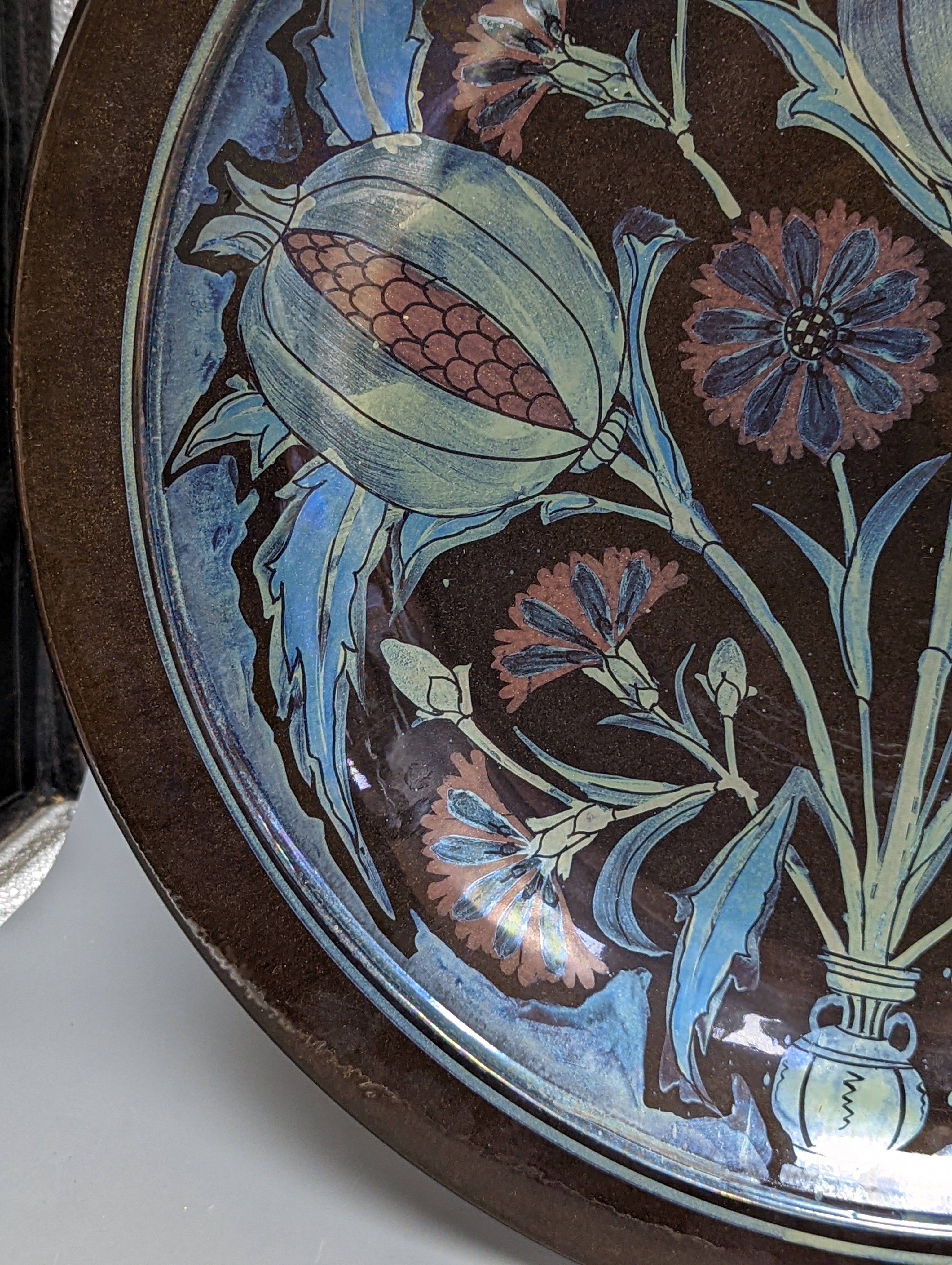 Jonathan Chiswell-Jones. A pomegranate pattern reduction fired lustre charger, numbered 4232, diameter 44cm